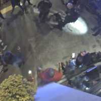 <p>A man has filed a lawsuit over an October 2019 incident in which video footage, pictured here, seems to show the man being thrown to the ground by a police officer and bitten by a K9 officer. Charges have been dropped against the alleged victim.</p>