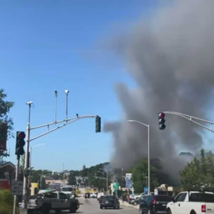 Screengrab from Adventure Awaits, Youtube, shows the start of a fire on Main Street in Worcester, Aug. 18.