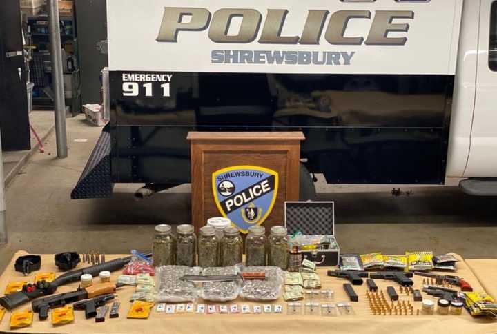 A hoard of firearms that included an AK-47 rifle and a whole lot of marijuana were seized by Shrewsbury Police during a recent arrest.