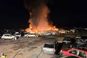 Parking Lot Full Of Cars In Flames; Cause Unknown