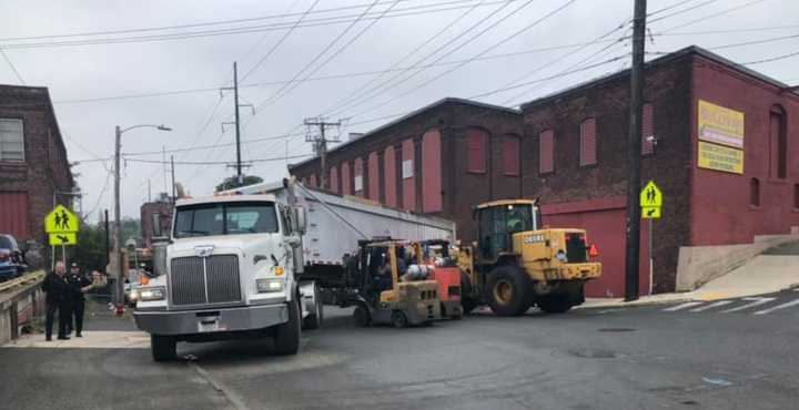 A 50-year-old man is in critical condition after the bicycle he was riding collided with a 16-wheeler Thursday, Sept. 10.