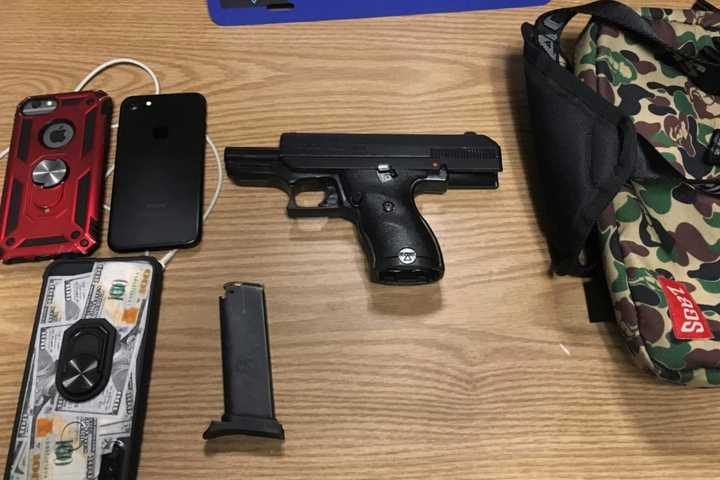 Guns, Cell Phones Seized; Revoked Registration Leads To Arrest