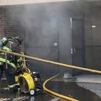 <p>Firefighter at a smoky blaze Sept. 30.</p>