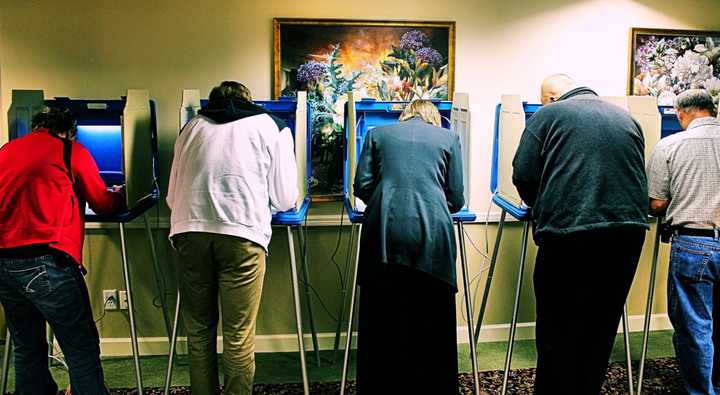 Voters at polling booths during an election