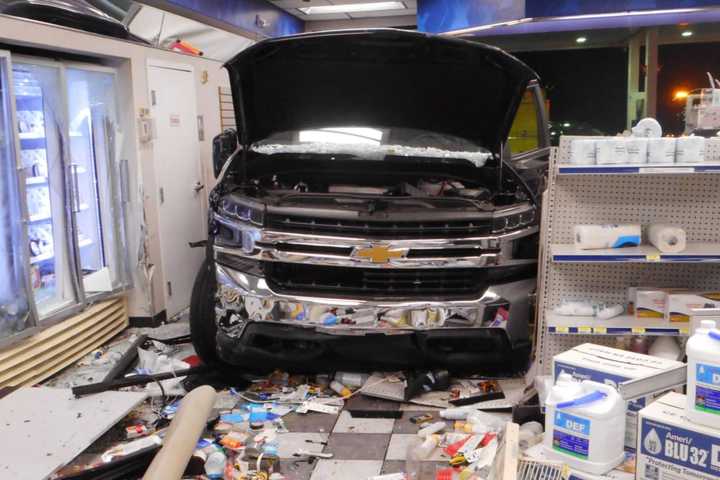 Truck Barrels Into Convenience Store