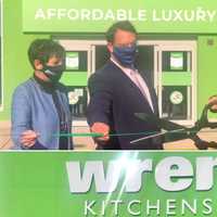 <p>At the grand opening of the largest kitchen showroom in US</p>