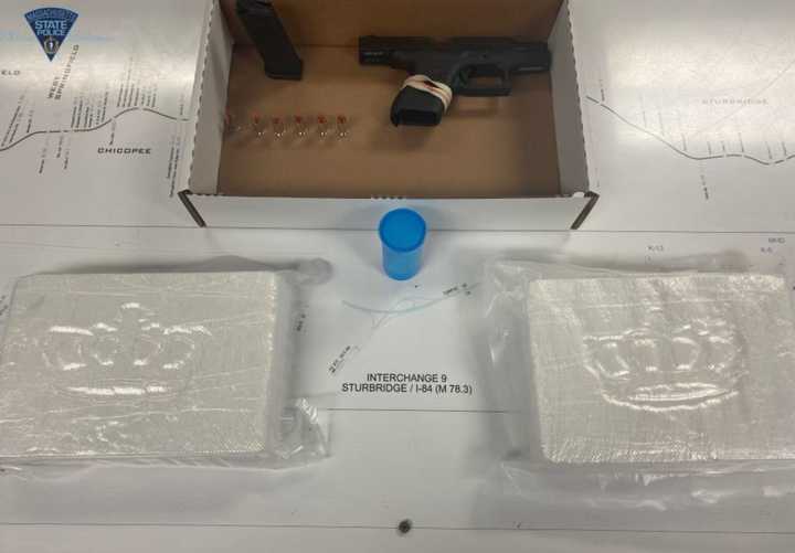 Suspected cocaine (2 kilos) and a Glock seized by Massachusetts State Police on Nov. 8.