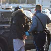 <p>Massachusetts State Police make an arrest on Sunday, Nov. 8.</p>