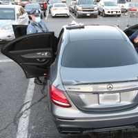 <p>Massachusetts State Police search an allegedly stolen vehicle on Sunday. Nov. 8.</p>