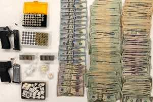 In Routine Check, Parole Officer Allegedly Finds Drugs, Cash, Guns