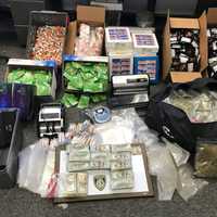 <p>Items allegedly seized by law enforcement at an Elam Road residence in Fitchburg</p>