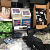 <p>Items allegedly seized by law enforcement at an Elam Road residence in Fitchburg</p>