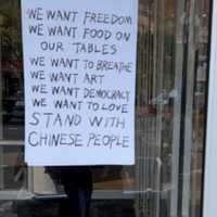 <p>This poster is what upset Xiaolei Wu, the FBI alleges.</p>