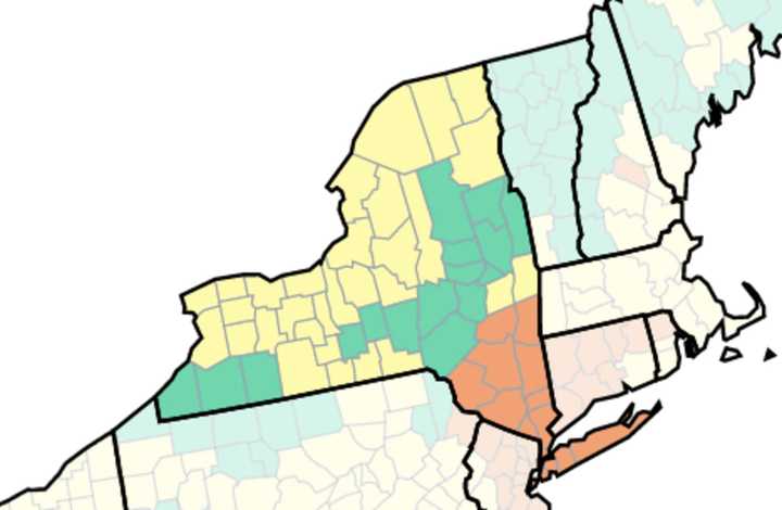 Counties shown in orange are where the CDC advises wearing masks indoors. Yellow counties are places in which those at high risk for severe disease should be cautious, and in green counties, indoor masking is not necessary.