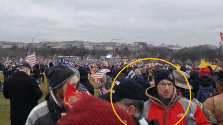 Federal investigators say the man circled in this photo is ex-Boston K-9 officer Joseph Fisher taking part in a Jan. 6, 2021, rally in Washington, D.C. Agents said he would later illegally enter the Capitol and assault a police officer.