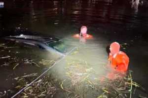 Officers Rescue Pair Neck-Deep In Freezing Waters As Car Plunges Into Pequannock Pond: WATCH