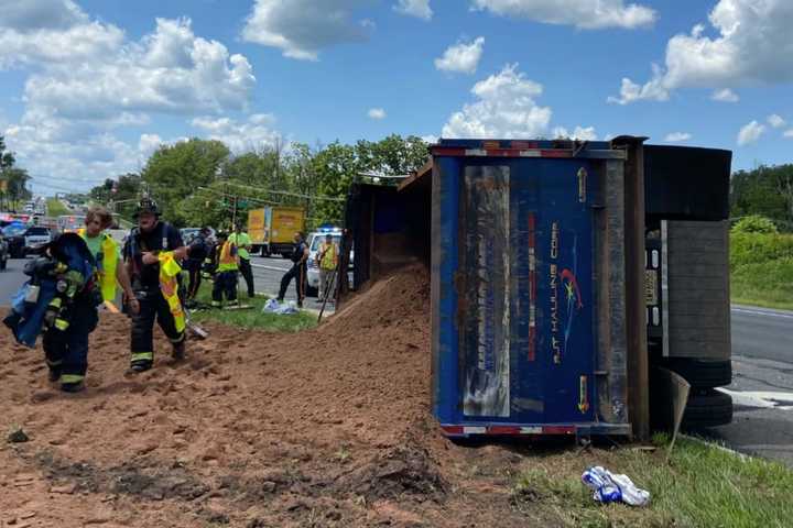 Dump Truck Overturns On Rt. 202, Scattering Dirt And Injuring Driver (UPDATE)