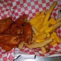 <p>Wings and cheese fries.&nbsp;</p>