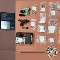 <p>The seized drugs and weapons</p>