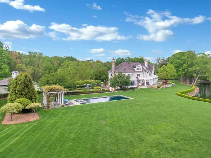 The estate sits on nearly 20 private acres.