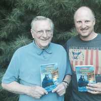 <p>Robert A. Skead and Robert J. Skead, from left, pose with &quot;Submarines, Secrets and a Dark Rescue,&quot; the sequel to their first novel, &quot;Patriots, Redcoats and Spies.&quot;</p>