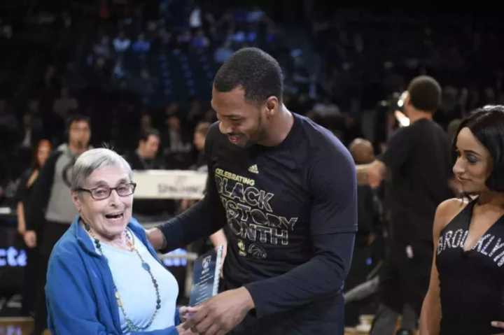 Sean Kilpatrick, seen here honoring his former English teacher, will have his jersey retired by White Plains High School.