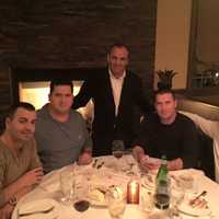 <p>Sal Derguti, co-owner of Sparkill Steakhouse, schmoozes with customers.</p>