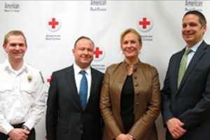 Red Cross Honors Norwalk Hospital President For Work To Place AEDs In Towns