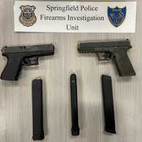 <p>Springfield police say they found these guns and high-capacity magazines during a raid in Chicopee, where they arrested three teens.</p>