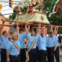 <p>Society members with the St. Rocco statue</p>