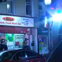 <p>Police investigating the stabbing at the food mart in Spring Valley.</p>