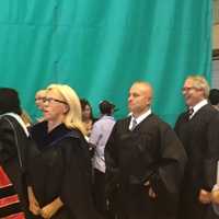 <p>Ramapo Central Board of Education members Theresa DiFalco, Clarke Osborn, and Craig Long during the Suffern High School commencement ceremony.</p>