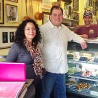 <p>Alex Evans, left, who guides the Suffern Chamber of Commerce&#x27;s social media campaign, stands with Chamber president Aury Licata, center, and Cynthia Gray and Michael Narciso, owners of Mia&#x27;s Kitchen, a village restaurant.</p>