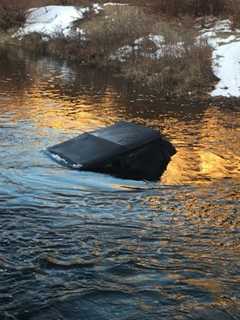 Vehicle Goes Off Road Into Ramapo River With Four On Board