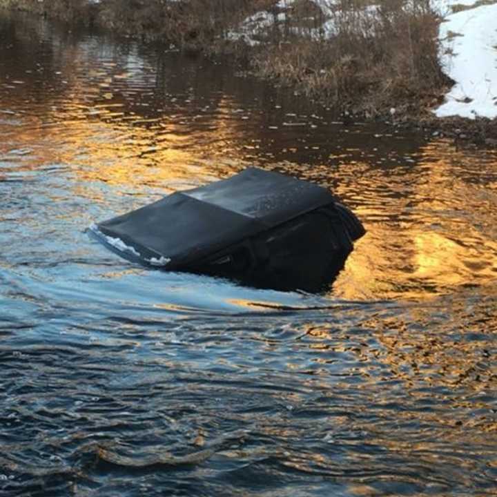 Mahwah Police are investigating why a car went off the road with four people inside into the Ramapo River early Saturday morning.