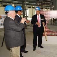 <p>Michael D. Israel, president/CEO of Westchester Medical Center Health Network and Dr. Mary P. Leahy, CEO of Bon Secours Charity Health System, smashed a ceremonial wall to kick off construction of new orthopedic and bariatric units.</p>