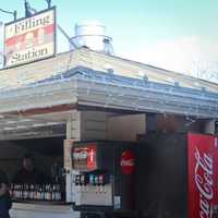 <p>The Filling Station in Palisades, plunked down in a wooded strip of Route 9, has been compared to eateries in the Hamptons.</p>