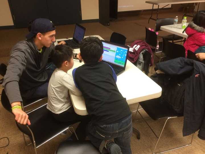 John Melizanis instructs students.