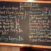 <p>Just a small portion of the bottled brews that are offered at The Beer Spot &amp; Grill in Fort Lee.</p>