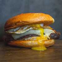 <p>The Banker: brisket, two eggs, spicy aioli and Swiss cheese.</p>