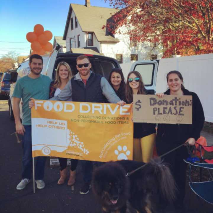 Theresa Paulovic hosts her second annual “Fill-A-Van” food drive in her neighborhood in Norwalk.