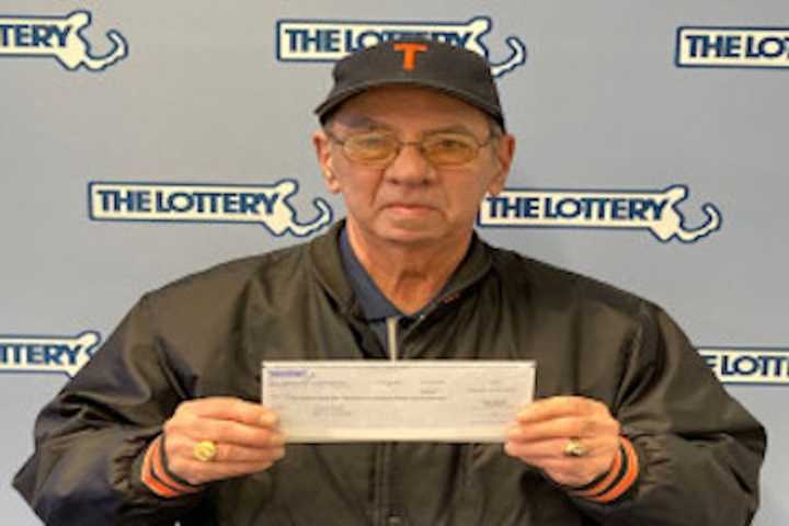 Thomas Boileau and his winning check.