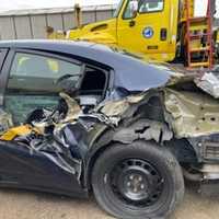 <p>A parked New York State Police car was struck by a Freightliner box truck on Tuesday, Nov. 30.</p>