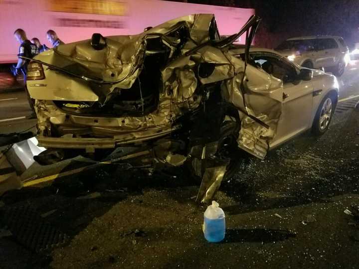 The driver of a tow truck intentionally crashed into this unoccupied Connecticut State Police cruiser on the median of I-95 in Greenwich during a police chase.