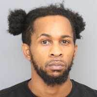 Wanted Convicted Felon Busted Attempting To Hide Stolen Gun From Police In Maryland