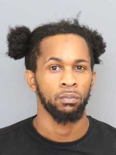 Wanted Convicted Felon Busted Attempting To Hide Stolen Gun From Police In Maryland