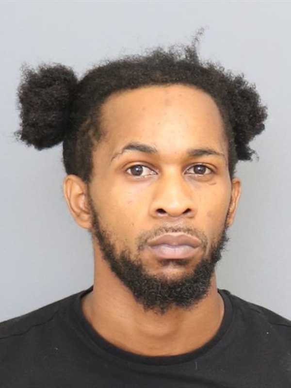 Wanted Convicted Felon Busted Attempting To Hide Stolen Gun From Police In Maryland