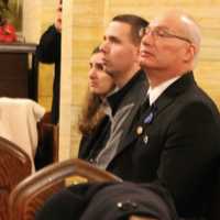 <p>Stephen Petruzzello&#x27;s father, Ron, and loved ones at Mass in Fairview.</p>