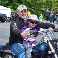 <p>Michael Manetta with his granddaughter, Amelia.</p>