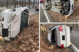 Driver Hospitalized After Car Rolls On Side Into Woods In Carmel